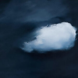 Single white cloud on a dark sky painting